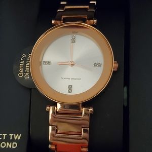 Womens rose gold genuine diamond watch